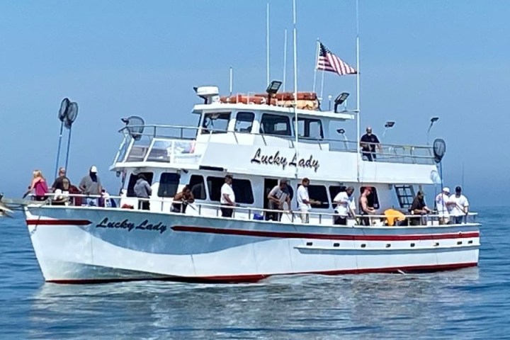 a small boat in a large body of water
