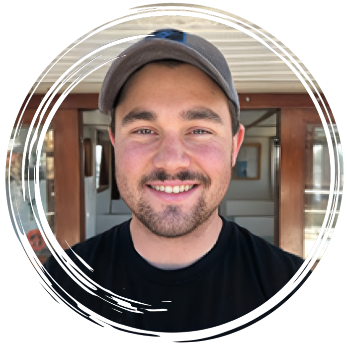 a man standing in front of a mirror posing for the camera