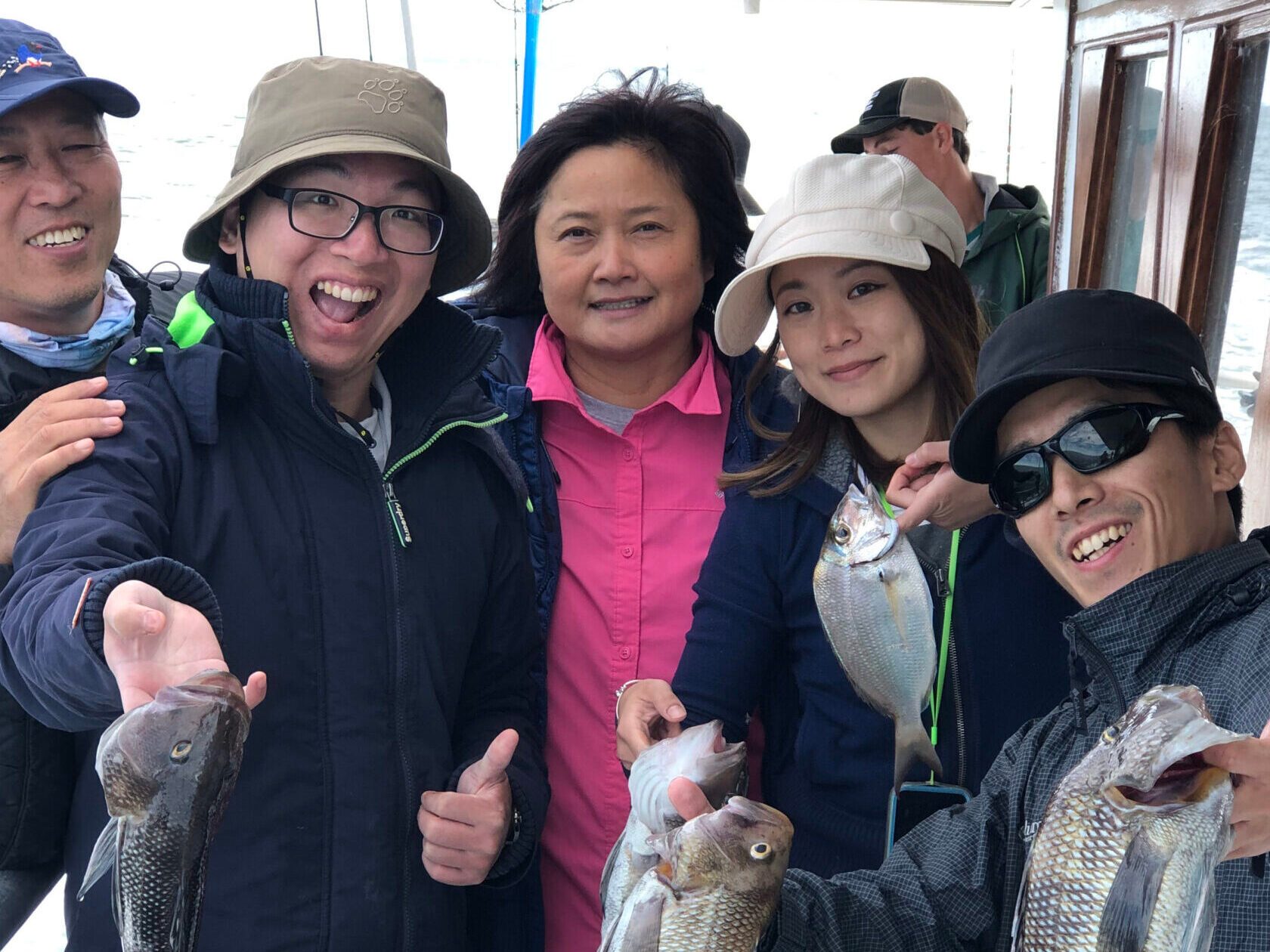 a group of people posing for the camera